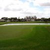 A view of green #12 with water in backgroud at Carolina Golf Club
